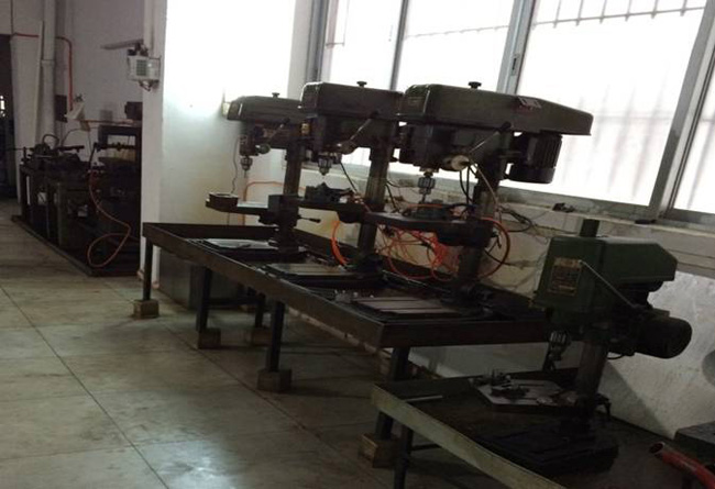 Drilling and tapping machine